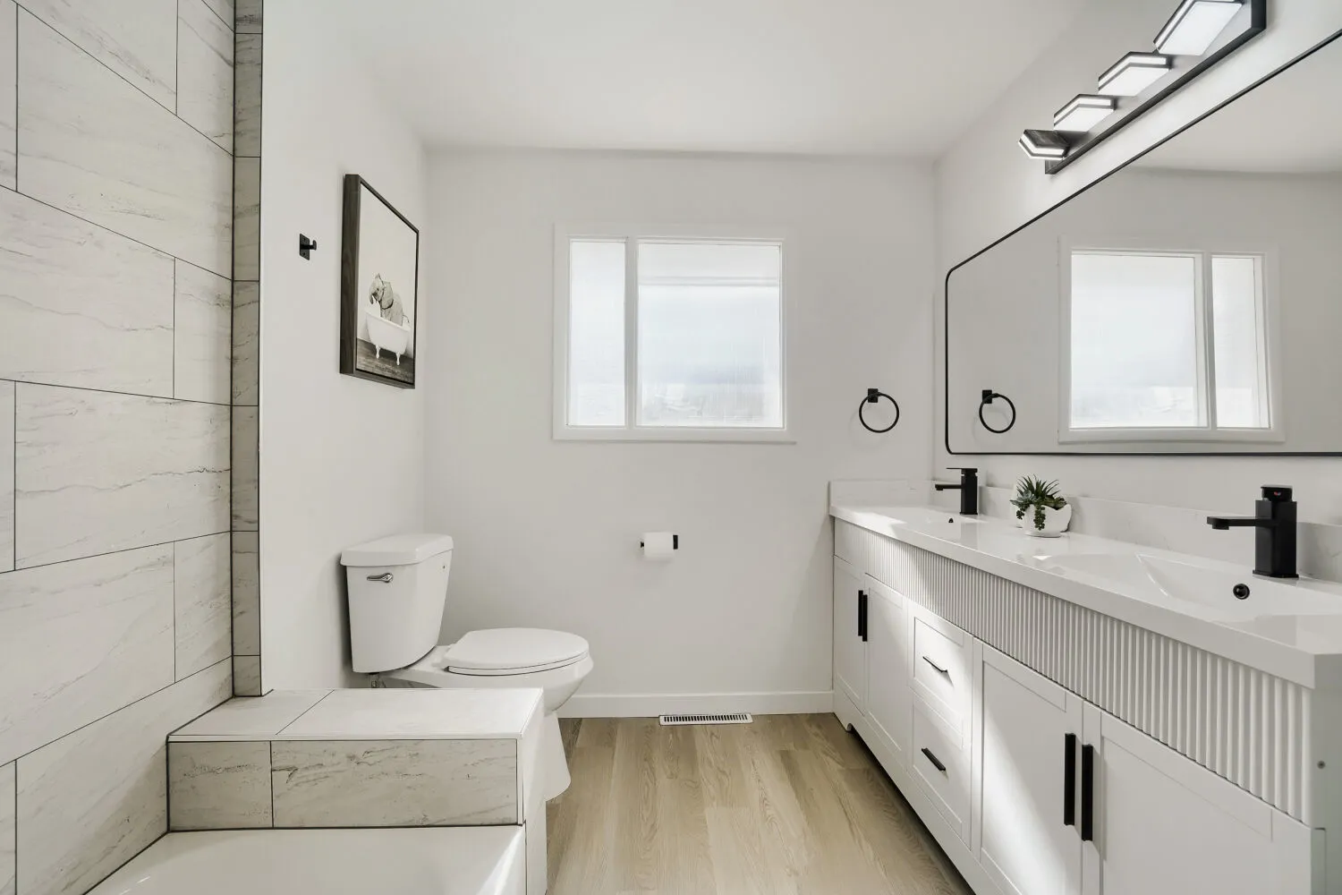 Main floor full bath with double vanity